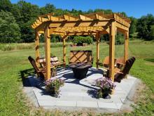 wood swing gola with fire pit